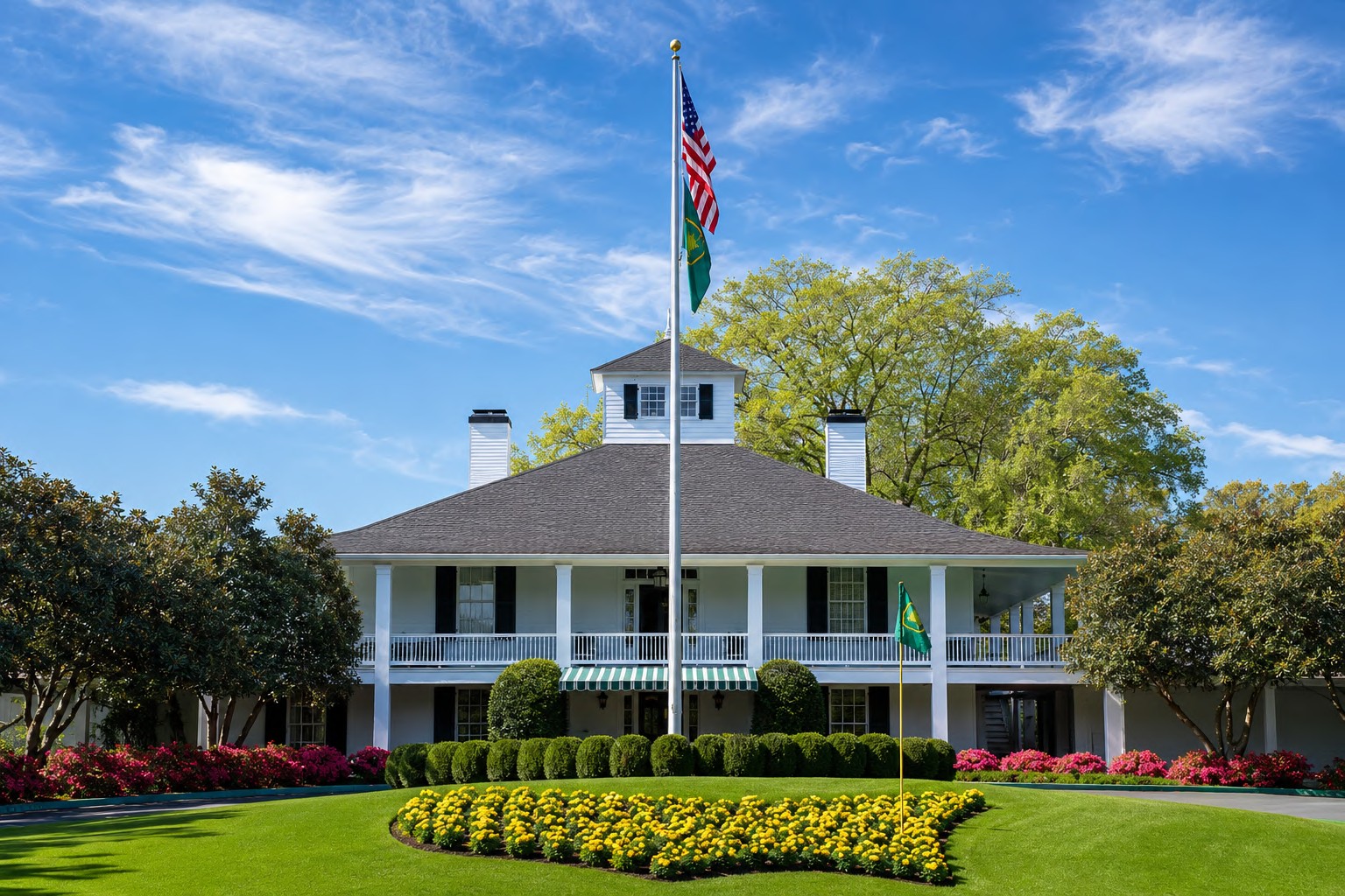 Augusta National clubhouse beneath a blue sky