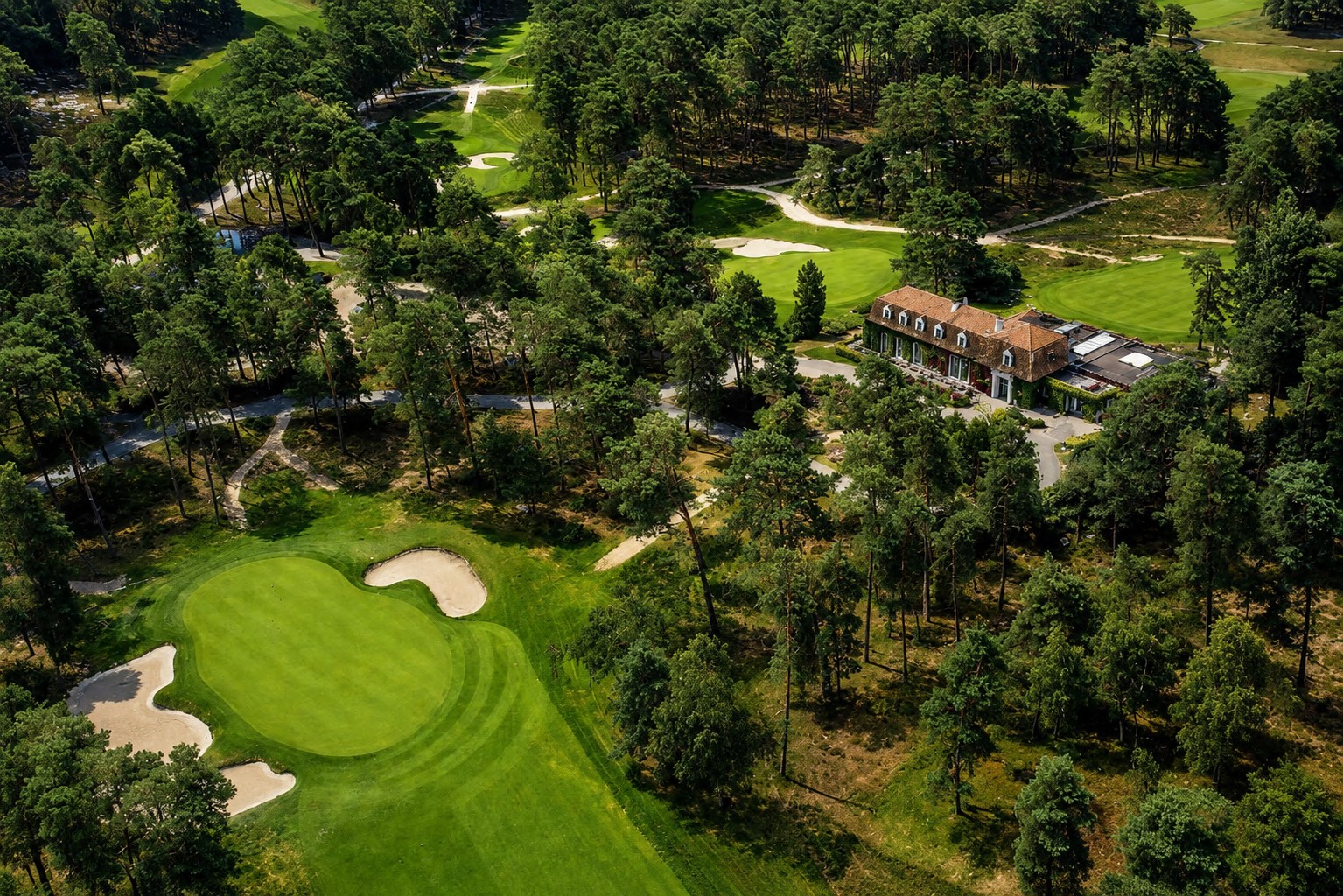 Morfontaine golf course winding through woodland
